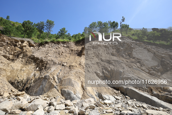 A section of BP Highway, a major highway that connects Kathmandu directly with the Southern Plains of Nepal, is damaged by a landslide in Ka...