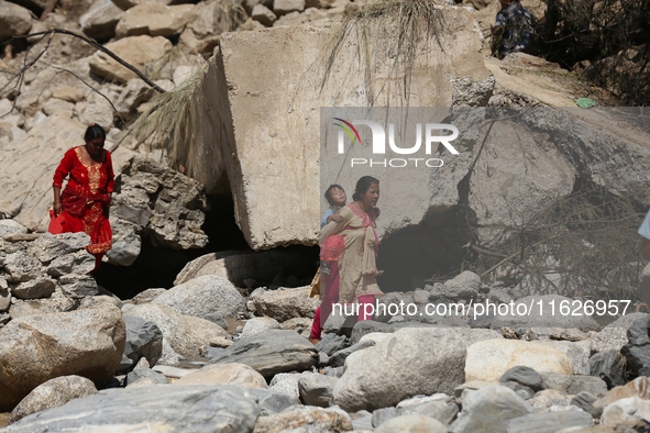 Nepali passengers travel through the BP Highway, a major highway that connects Kathmandu directly with the Southern Plains of Nepal, making...