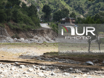 Nepali passengers travel through the BP Highway, a major highway that connects Kathmandu directly with the Southern Plains of Nepal, making...