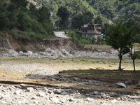 Nepali passengers travel through the BP Highway, a major highway that connects Kathmandu directly with the Southern Plains of Nepal, making...