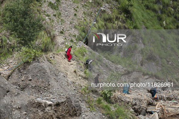 Nepali passengers travel through the BP Highway, a major highway that connects Kathmandu directly with the Southern Plains of Nepal, making...