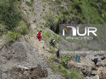 Nepali passengers travel through the BP Highway, a major highway that connects Kathmandu directly with the Southern Plains of Nepal, making...