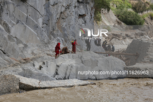 Nepali passengers travel through the BP Highway, a major highway that connects Kathmandu directly with the Southern Plains of Nepal, making...