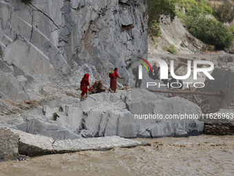 Nepali passengers travel through the BP Highway, a major highway that connects Kathmandu directly with the Southern Plains of Nepal, making...