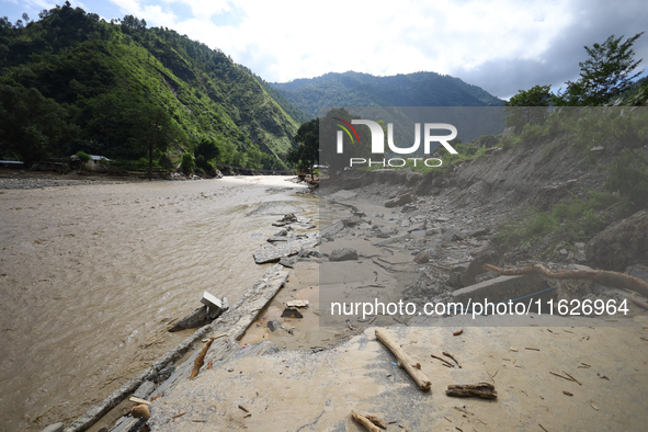 A section of BP Highway, a major highway that connects Kathmandu directly with the Southern Plains of Nepal, is damaged by a landslide in Ka...