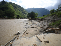 A section of BP Highway, a major highway that connects Kathmandu directly with the Southern Plains of Nepal, is damaged by a landslide in Ka...