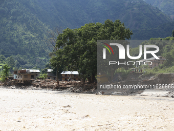 A section of BP Highway, a major highway that connects Kathmandu directly with the Southern Plains of Nepal, is damaged by a landslide in Ka...