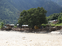 A section of BP Highway, a major highway that connects Kathmandu directly with the Southern Plains of Nepal, is damaged by a landslide in Ka...