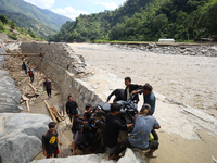 Nepali passengers traveling through the BP Highway, a major highway that connects Kathmandu directly with the Southern Plains of Nepal, carr...