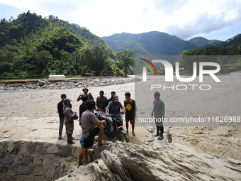 Nepali passengers traveling through the BP Highway, a major highway that connects Kathmandu directly with the Southern Plains of Nepal, carr...