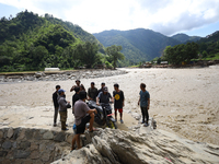 Nepali passengers traveling through the BP Highway, a major highway that connects Kathmandu directly with the Southern Plains of Nepal, carr...