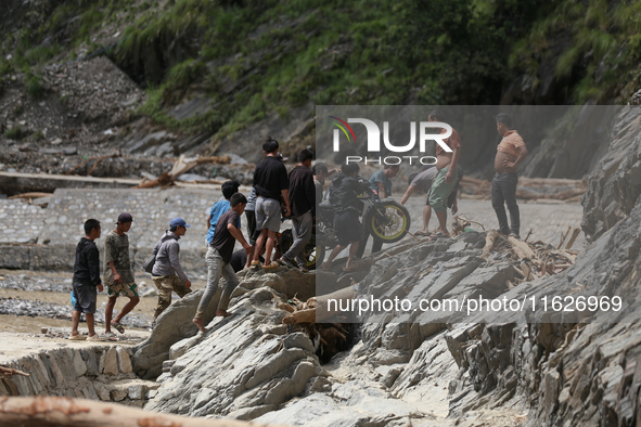 Nepali passengers traveling through the BP Highway, a major highway that connects Kathmandu directly with the Southern Plains of Nepal, carr...