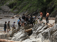 Nepali passengers traveling through the BP Highway, a major highway that connects Kathmandu directly with the Southern Plains of Nepal, carr...