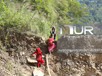 Nepali passengers travel through the BP Highway, a major highway that connects Kathmandu directly with the Southern Plains of Nepal, making...