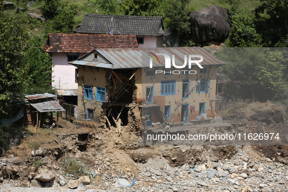 A house sustains damage from flooding in Kavrepalanchowk District along the BP Highway of Nepal, on October 1, 2024. 