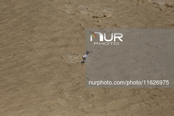 A Nepali passenger traveling through the BP Highway, a major highway that connects Kathmandu directly with the Southern Plains of Nepal, wad...