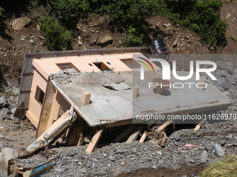 A house sustains damage from flooding in Kavrepalanchowk District along the BP Highway of Nepal, on October 1, 2024. (