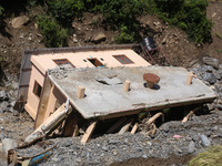 A house sustains damage from flooding in Kavrepalanchowk District along the BP Highway of Nepal, on October 1, 2024. (