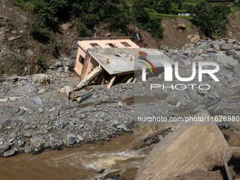 A house sustains damage from flooding in Kavrepalanchowk District along the BP Highway of Nepal, on October 1, 2024. (