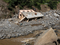 A house sustains damage from flooding in Kavrepalanchowk District along the BP Highway of Nepal, on October 1, 2024. (