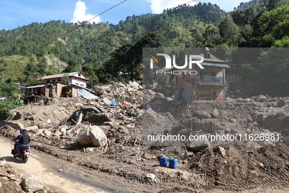 A house sustains damage from flooding in Kavrepalanchowk District along the BP Highway of Nepal, on October 1, 2024. 