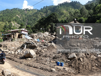 A house sustains damage from flooding in Kavrepalanchowk District along the BP Highway of Nepal, on October 1, 2024. (