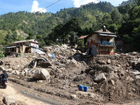 A house sustains damage from flooding in Kavrepalanchowk District along the BP Highway of Nepal, on October 1, 2024. (