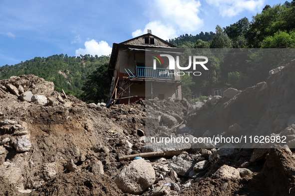 A house sustains damage from flooding in Kavrepalanchowk District along the BP Highway of Nepal, on October 1, 2024. 