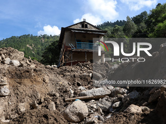 A house sustains damage from flooding in Kavrepalanchowk District along the BP Highway of Nepal, on October 1, 2024. (