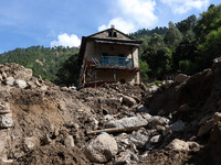 A house sustains damage from flooding in Kavrepalanchowk District along the BP Highway of Nepal, on October 1, 2024. (