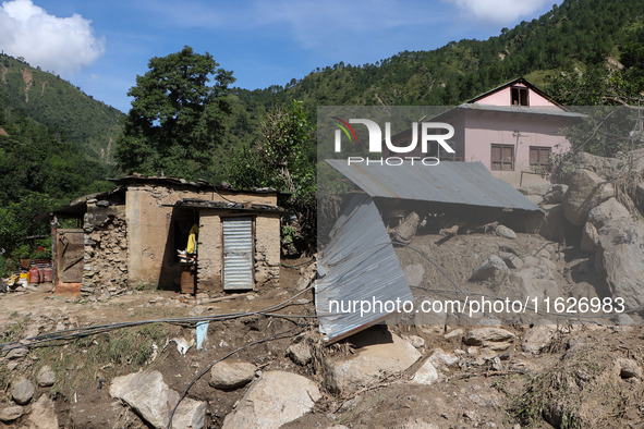 A house sustains damage from flooding in Kavrepalanchowk District along the BP Highway of Nepal, on October 1, 2024. 