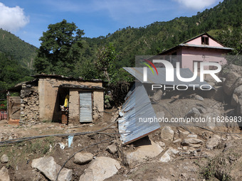 A house sustains damage from flooding in Kavrepalanchowk District along the BP Highway of Nepal, on October 1, 2024. (