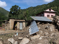 A house sustains damage from flooding in Kavrepalanchowk District along the BP Highway of Nepal, on October 1, 2024. (