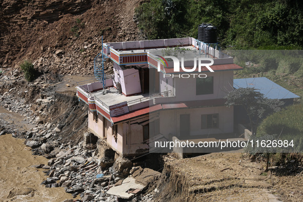 A house sustains damage from flooding in Kavrepalanchowk District along the BP Highway of Nepal, on October 1, 2024. 