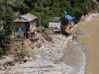 A house sustains damage from flooding in Kavrepalanchowk District along the BP Highway of Nepal, on October 1, 2024. (