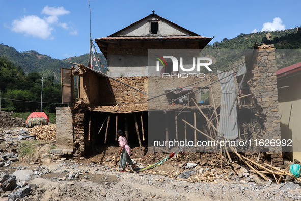 A house sustains damage from flooding in Kavrepalanchowk District along the BP Highway of Nepal, on October 1, 2024. 