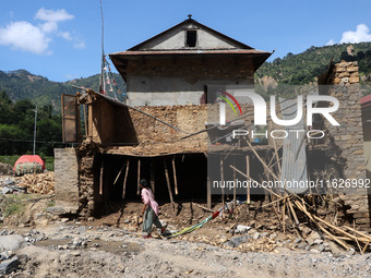 A house sustains damage from flooding in Kavrepalanchowk District along the BP Highway of Nepal, on October 1, 2024. (