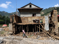 A house sustains damage from flooding in Kavrepalanchowk District along the BP Highway of Nepal, on October 1, 2024. (