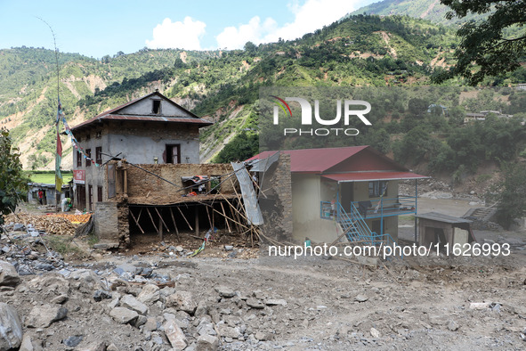 A house sustains damage from flooding in Kavrepalanchowk District along the BP Highway of Nepal, on October 1, 2024. 