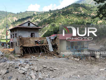 A house sustains damage from flooding in Kavrepalanchowk District along the BP Highway of Nepal, on October 1, 2024. (