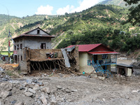 A house sustains damage from flooding in Kavrepalanchowk District along the BP Highway of Nepal, on October 1, 2024. (