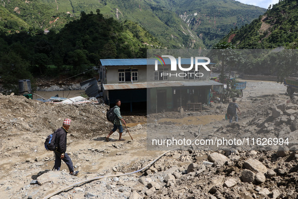 A house sustains damage from flooding in Kavrepalanchowk District along the BP Highway of Nepal, on October 1, 2024. 