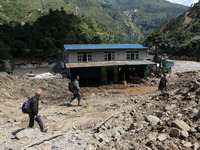 A house sustains damage from flooding in Kavrepalanchowk District along the BP Highway of Nepal, on October 1, 2024. (