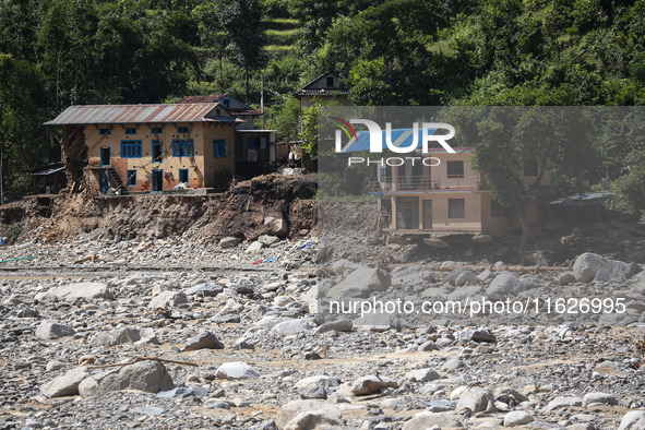 A house sustains damage from flooding in Kavrepalanchowk District along the BP Highway of Nepal, on October 1, 2024. 