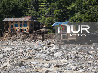 A house sustains damage from flooding in Kavrepalanchowk District along the BP Highway of Nepal, on October 1, 2024. (