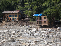 A house sustains damage from flooding in Kavrepalanchowk District along the BP Highway of Nepal, on October 1, 2024. (