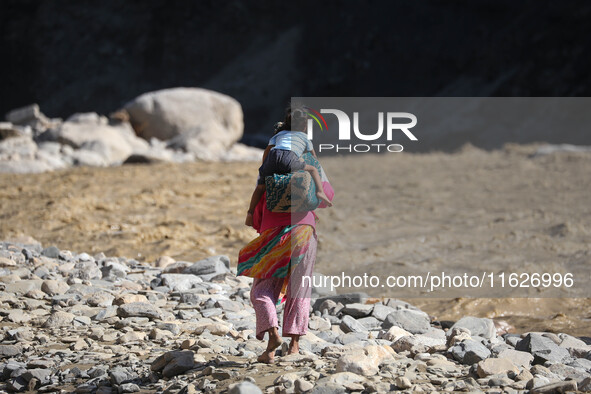 Nepali passengers traveling through the BP Highway, a major highway that connects Kathmandu directly with the Southern Plains of Nepal, make...