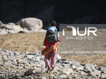 Nepali passengers traveling through the BP Highway, a major highway that connects Kathmandu directly with the Southern Plains of Nepal, make...