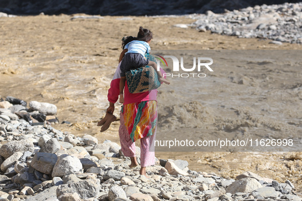 Nepali passengers traveling through the BP Highway, a major highway that connects Kathmandu directly with the Southern Plains of Nepal, make...