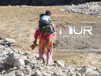 Nepali passengers traveling through the BP Highway, a major highway that connects Kathmandu directly with the Southern Plains of Nepal, make...